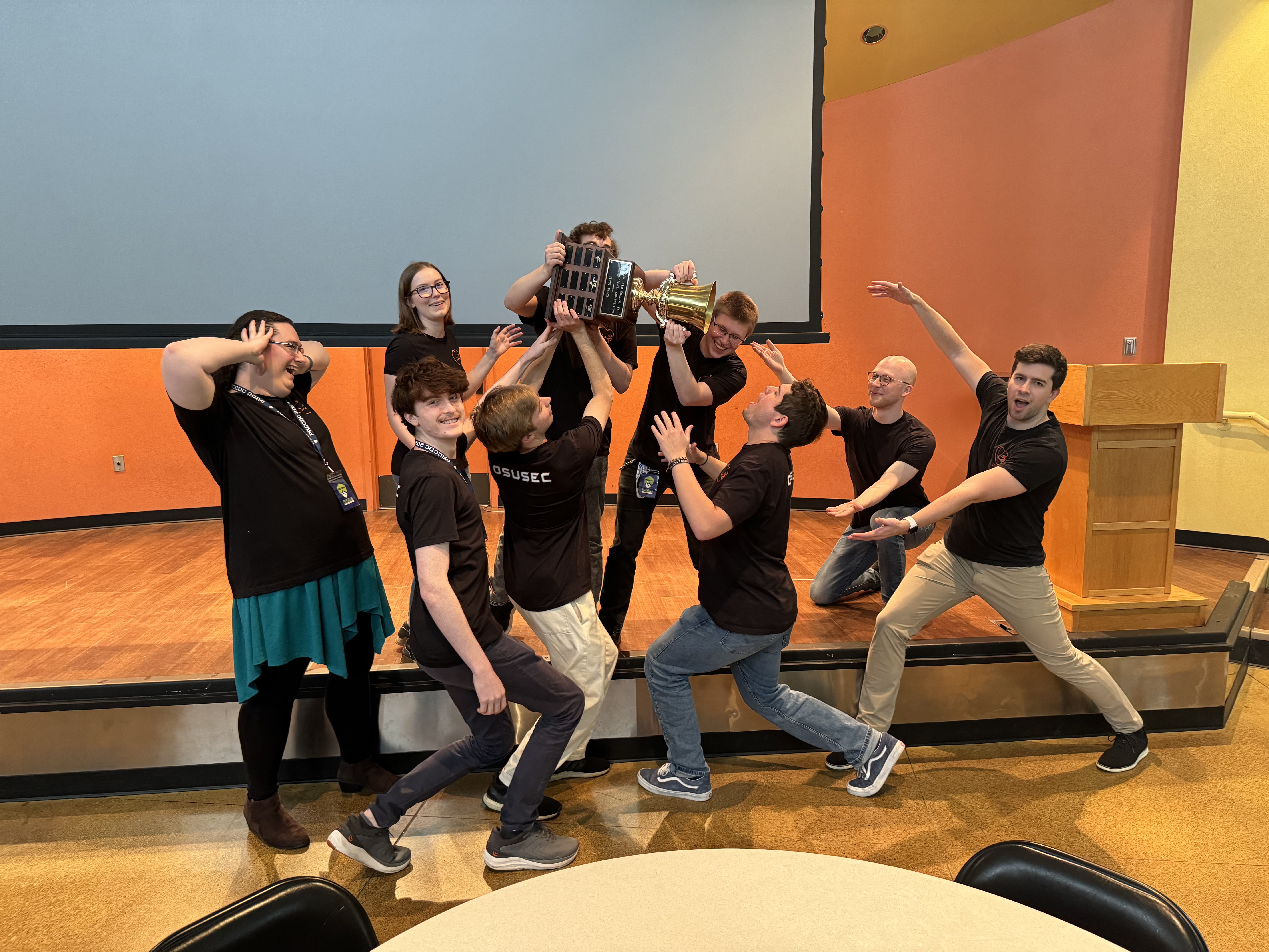 Picture of the team pouring from the trophy’s cup